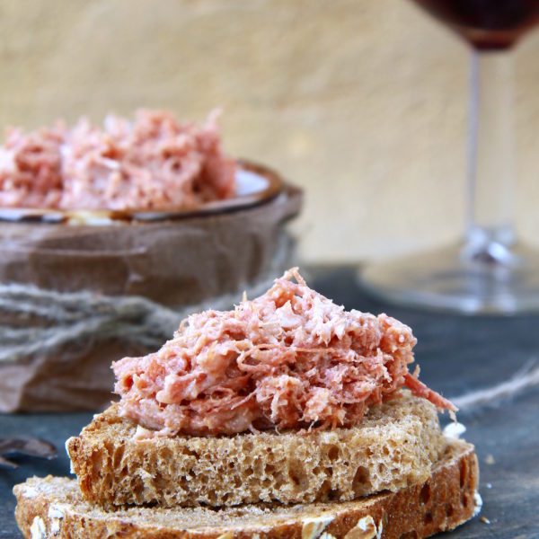 pate of duck meat Rillettes de Canard  with a glass of wine